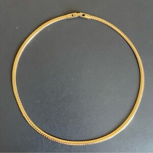 Gold tone omega Necklace.